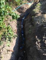 Aushubarbeiten und Einbau von Trinkwasserleitung